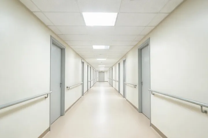 Hospital corridor with mold-resistant drywall and cleanable ceiling