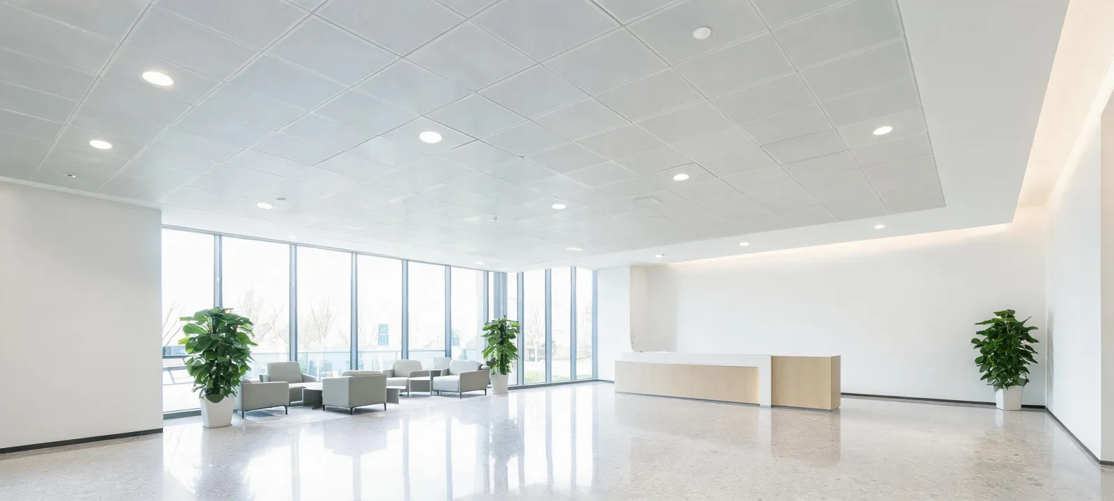 Completed commercial lobby with acoustical ceiling and gypsum wall finishes